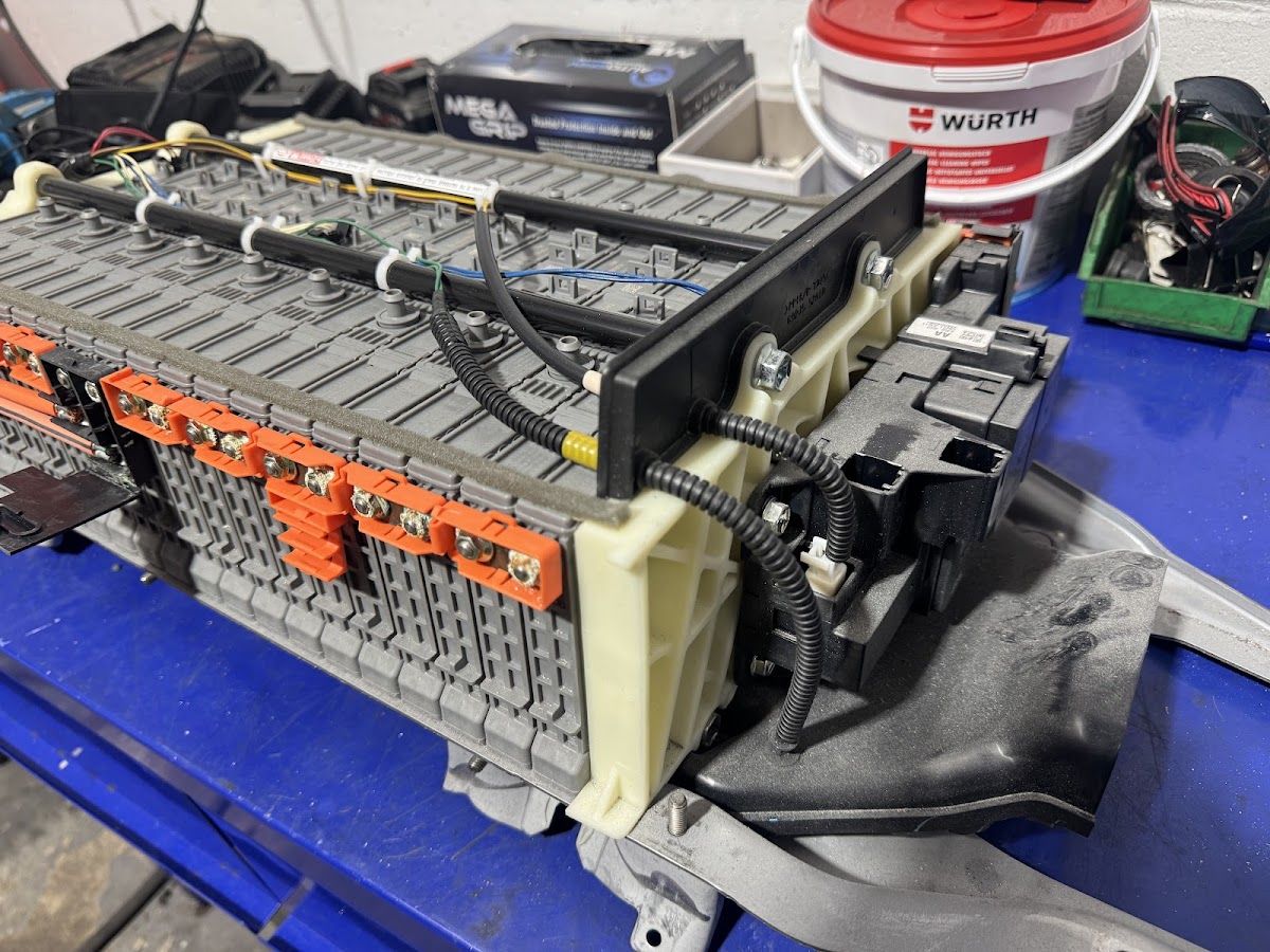 A hybrid battery pack being serviced on the workbench