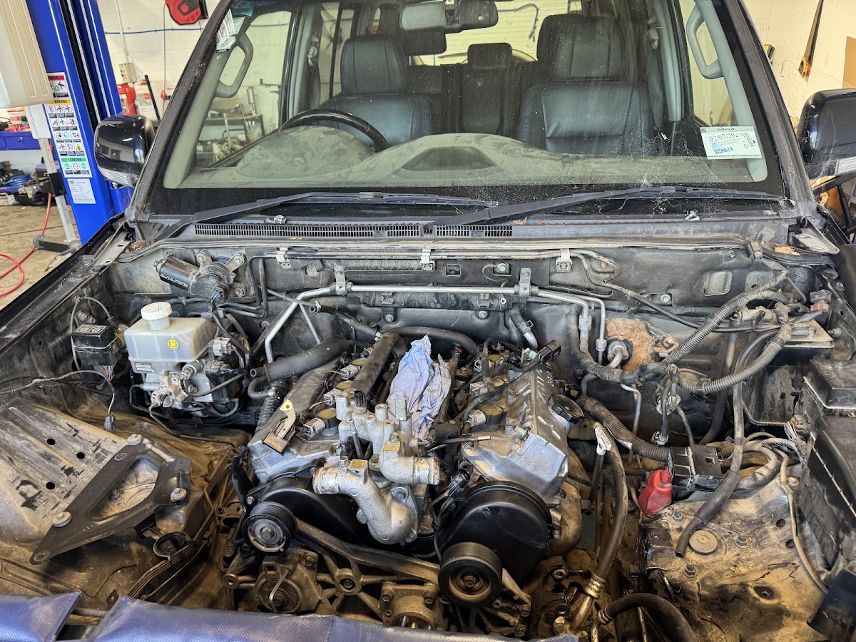 Detailed engine bay work on a 4WD at 99 Automobiles